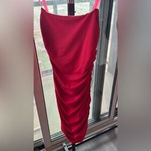 A mini bodycon dress from oh Polly in a US size 2. Fits like a glove.